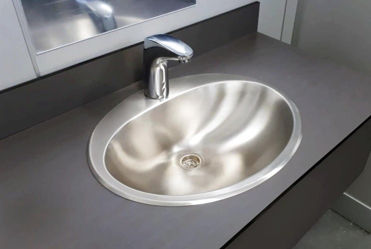 Britex S.S. oval regal basin with mounted sensor tap